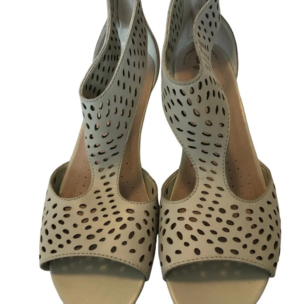 Collection by Clark’s. Abigail Ruby in Ivory. Perforated leather‎ wedges. 8.5